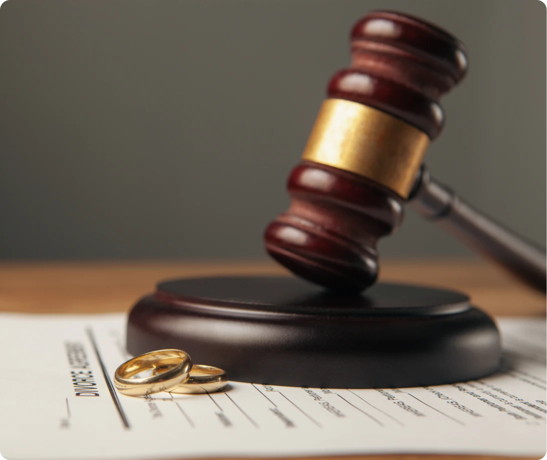 Legal separation concept with gavel and rings